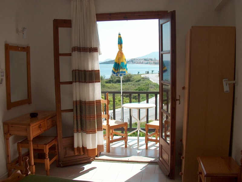 villageorgeroominsideandseaviewfromroom.jpg